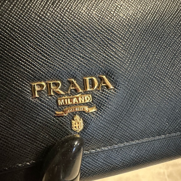 Prada wallet 7.5 x 3.5 black in excellent condition. Absolutely beautiful. - Picture 9 of 9